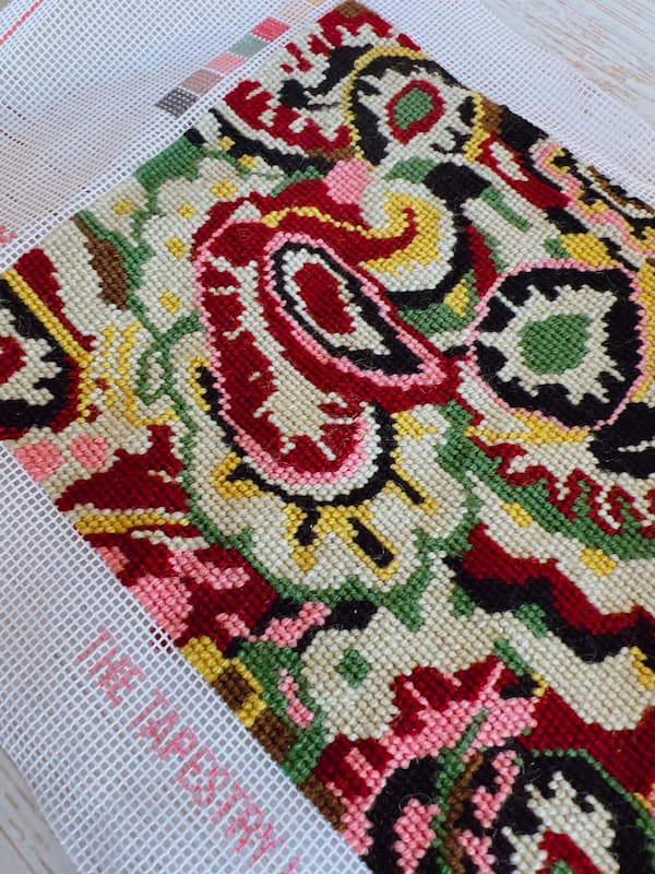 completed paisley tapestry with red, pink, yellow and cream cotton