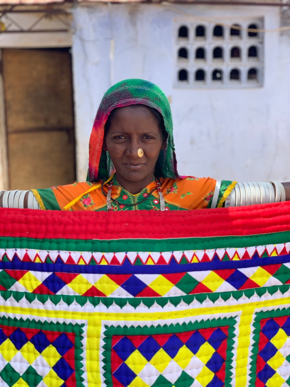 lady holding woven cloth