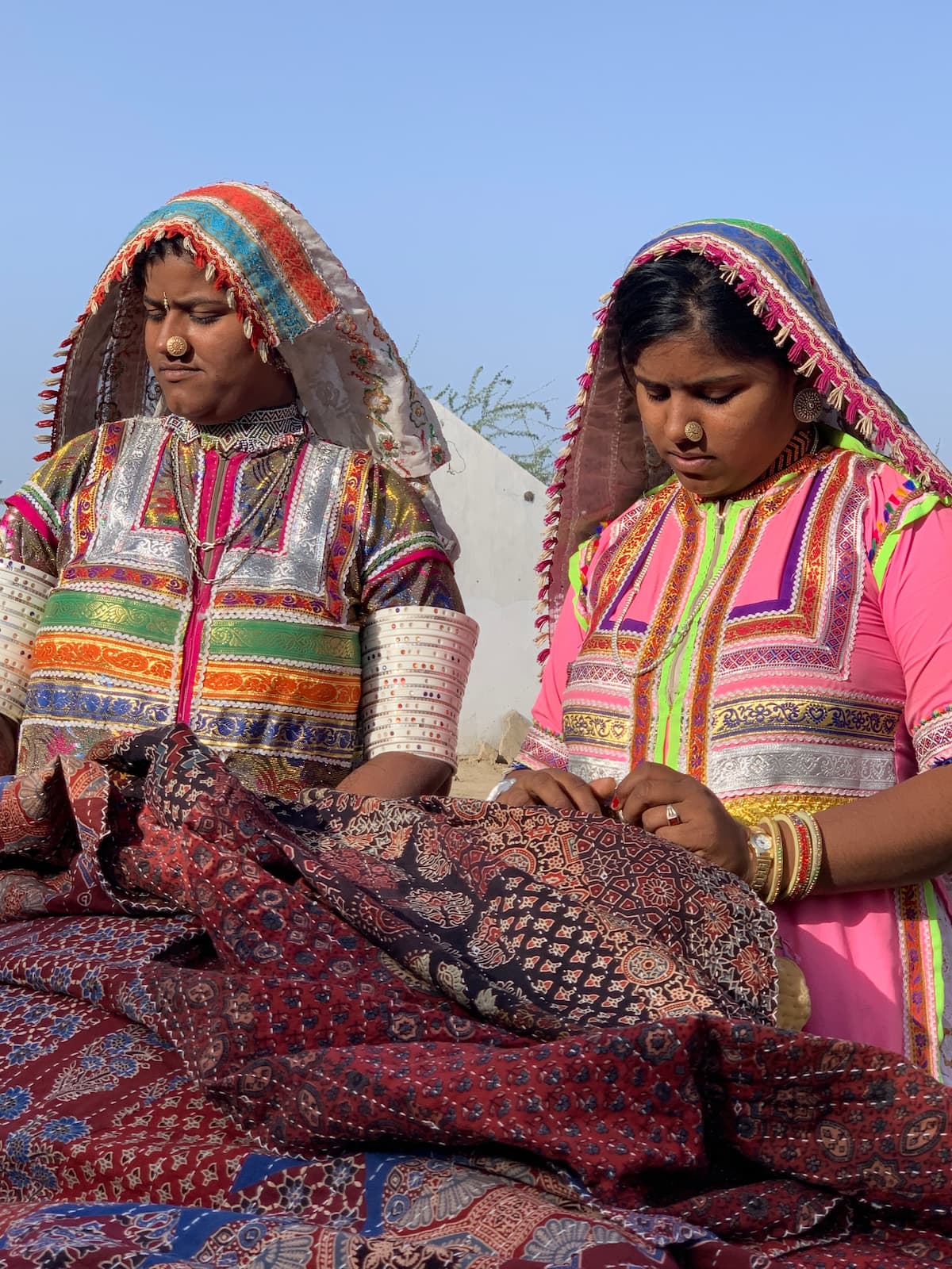 two women selling wares